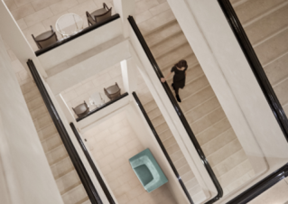 A woman walking down the stairway