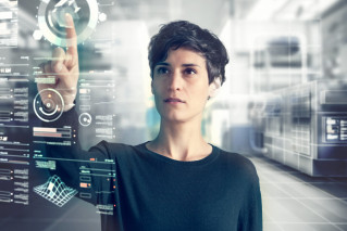 A person in front of a smart board
