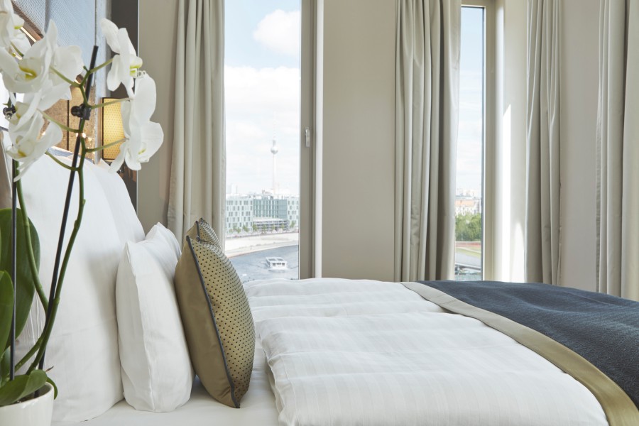 View of a Steigenberger Hotels & Reports bedroom during daytime