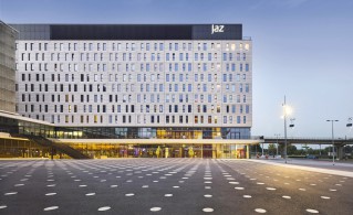 Architectural shot of a Jaz in the City hotel in the twilight